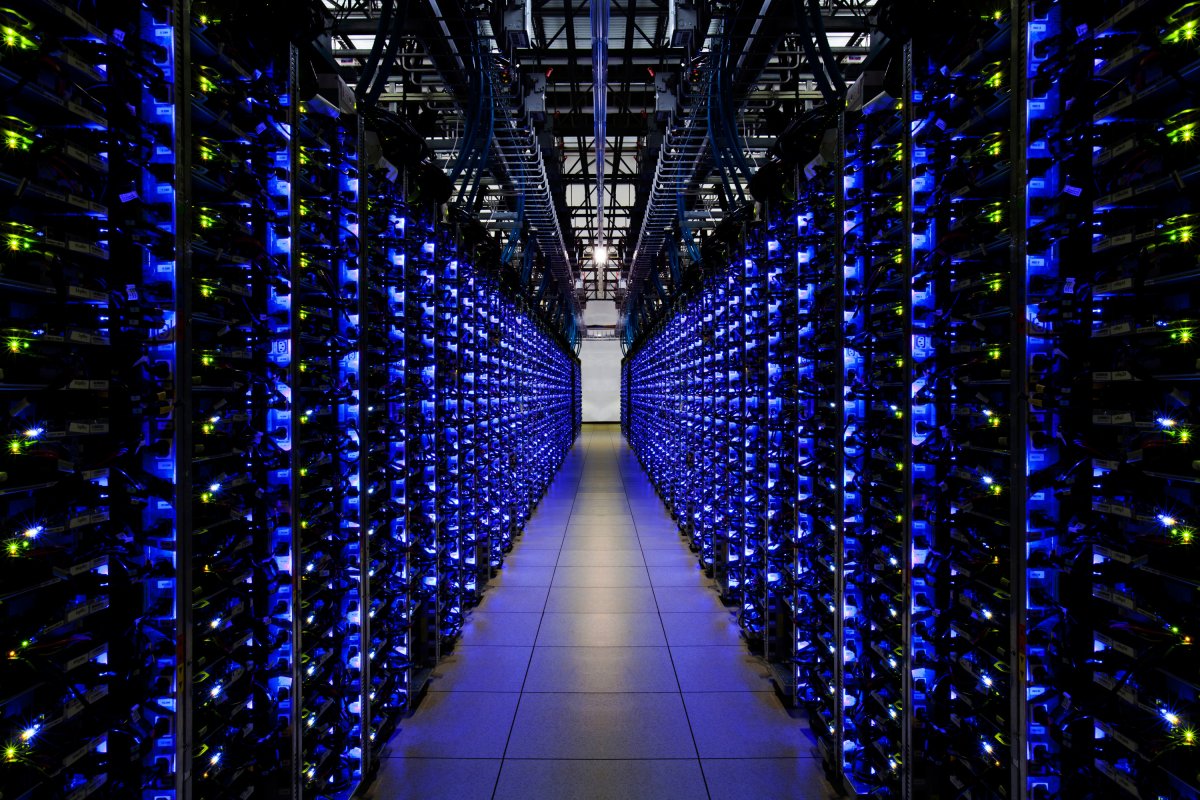 the-blue-leds-on-this-row-of-servers-let-employees-know-that-everything-is-running-smoothly-google-has-purchased-1000-megawatts-of-renewable-energy-to-power-these-data-centers-now-and-into-the-future