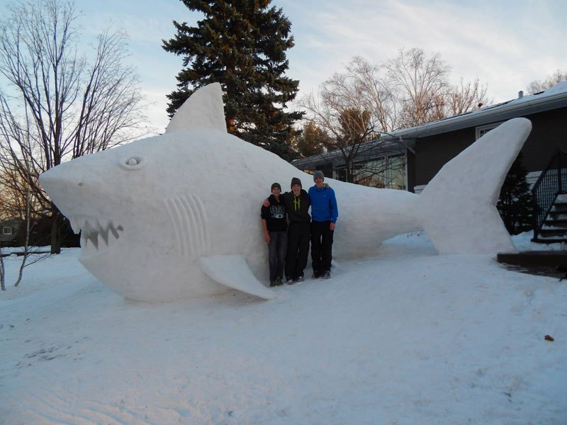 every-year-these-brothers-make-a-giant-snow-sculpture-on-their-front-lawn-1