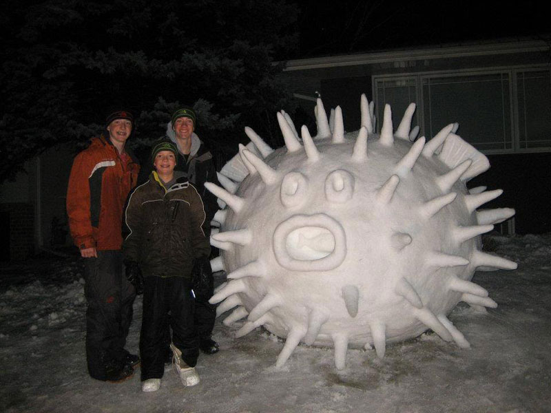 every-year-these-brothers-make-a-giant-snow-sculpture-on-their-front-lawn-2