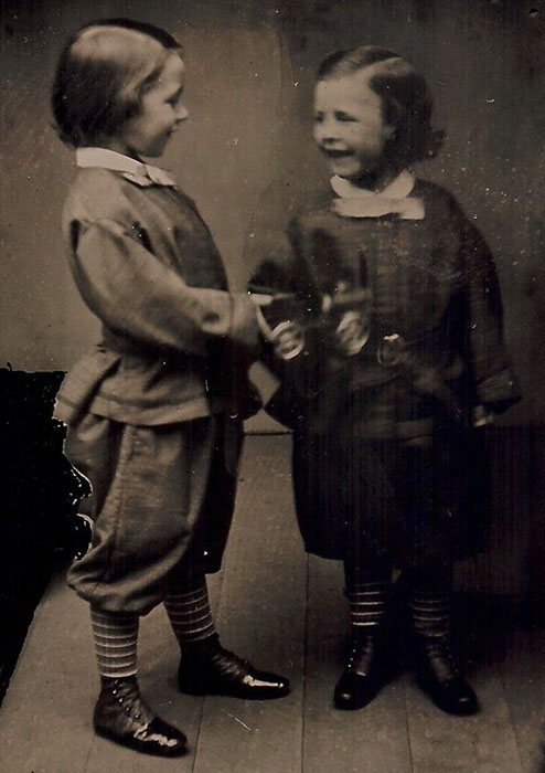 Ambrotype-of-two-children-with-a-toy-train-723x1024