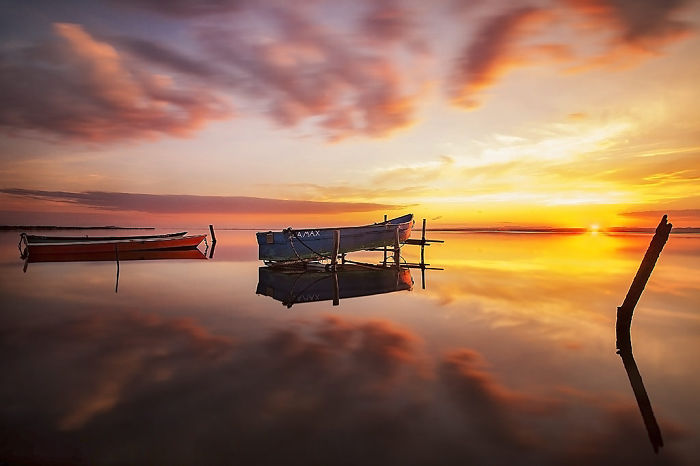 Floating-boat-at-sunset7__700